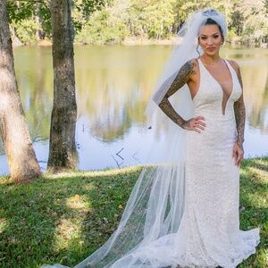 Wedding dress, cathedral veil, and elbow veil